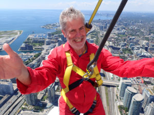 Jeff high above Toronto surviving the CN Tower Edgewalk.